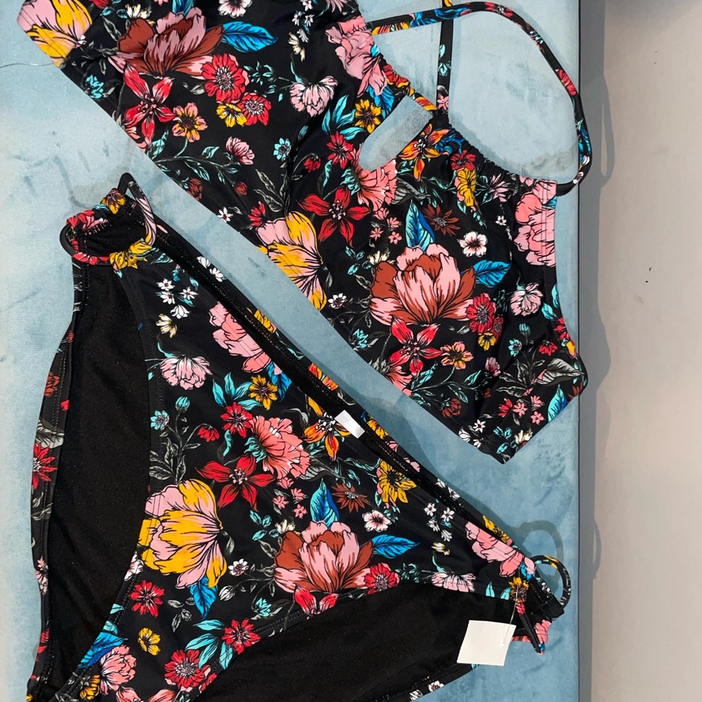 Two brand new bathing suits